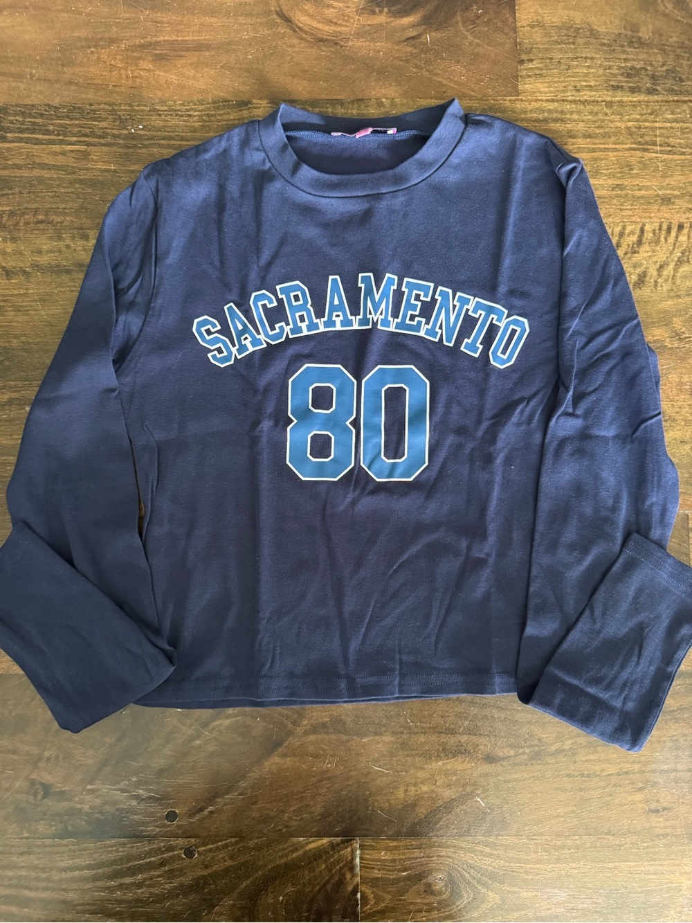 Edikted juniors crop top with Light Blue 'SACRAMENTO 80' Graphic
